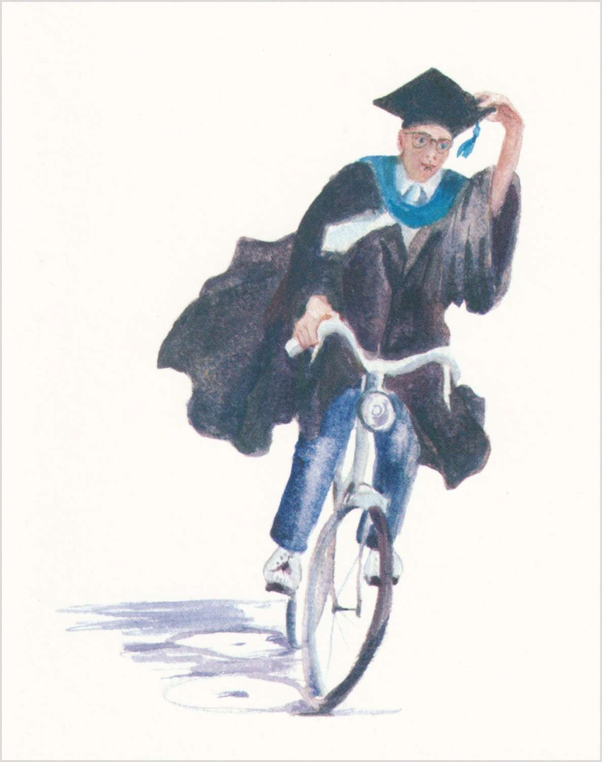 Male graduate on a bicycle