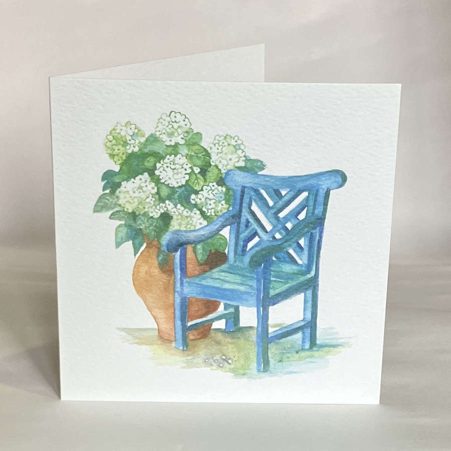 Blue chair, white hydrangea